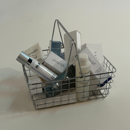 Acne-safe skincare products in shopping basket at Baby Face Skin Bar Cincinnati 2